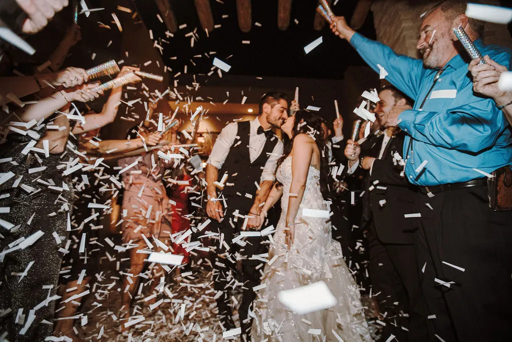 A couple's confetti exit at their New Mexico wedding